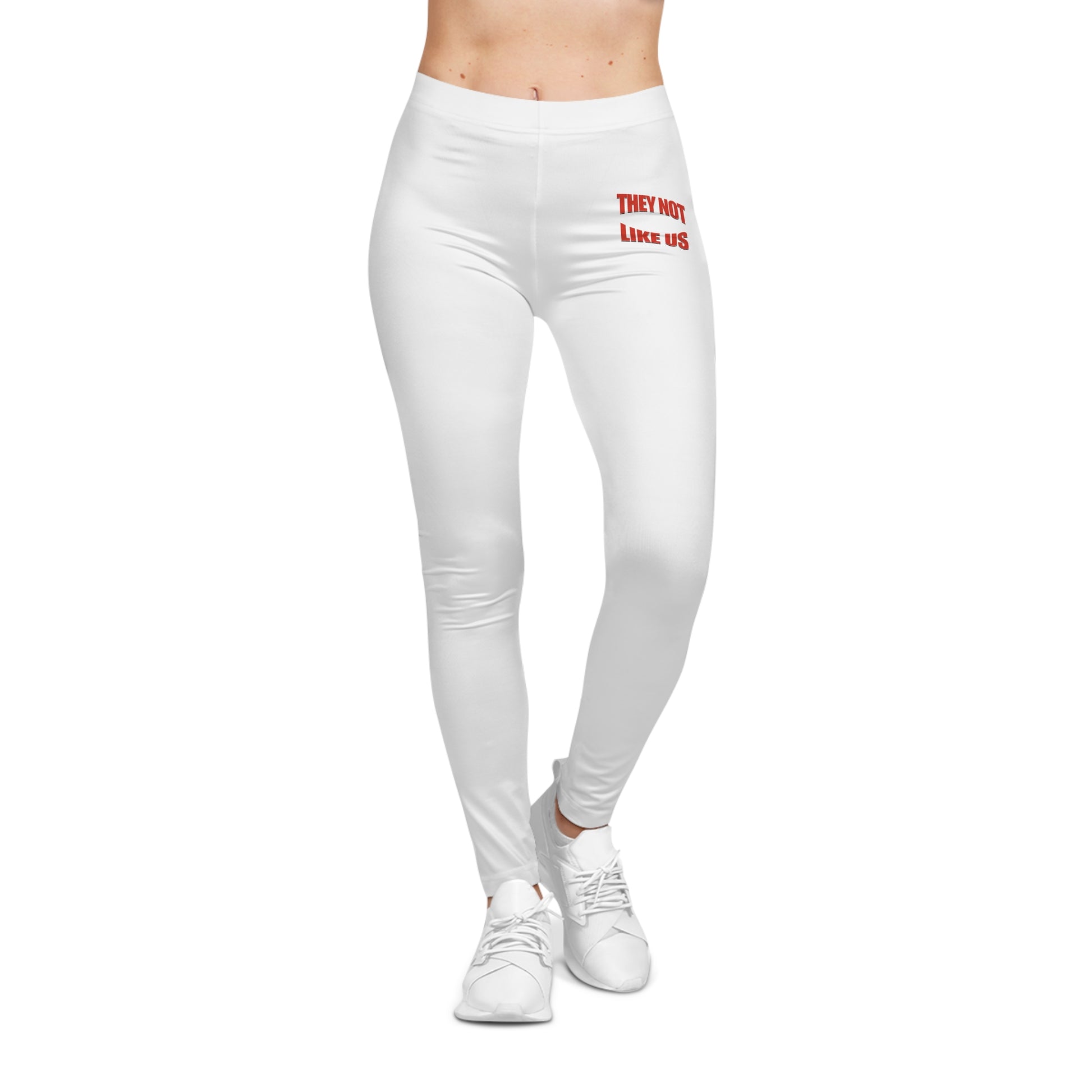 "White high-waisted leggings with bold 'They Not Like Us' design, trendy urban streetwear fit.
