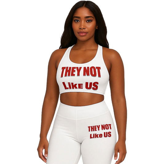 "White high-waisted leggings with bold 'They Not Like Us' design, trendy urban streetwear fit.